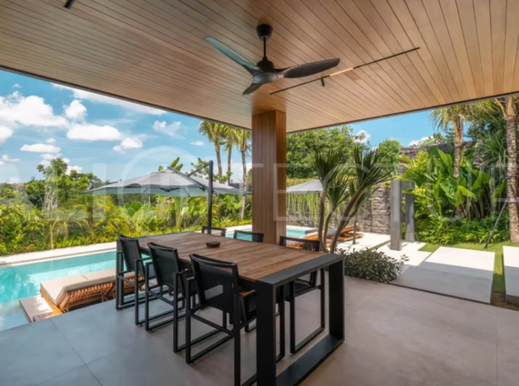 Luxury four bedroom leasehold villa in Canggu, Bali, featuring a private garden, 45sqm swimming pool, spacious living area, modern kitchen, outdoor terrace, jacuzzi, and premium entertainment amenities.