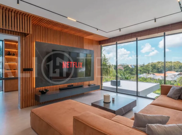 Luxury four bedroom leasehold villa in Canggu, Bali, featuring a private garden, 45sqm swimming pool, spacious living area, modern kitchen, outdoor terrace, jacuzzi, and premium entertainment amenities.