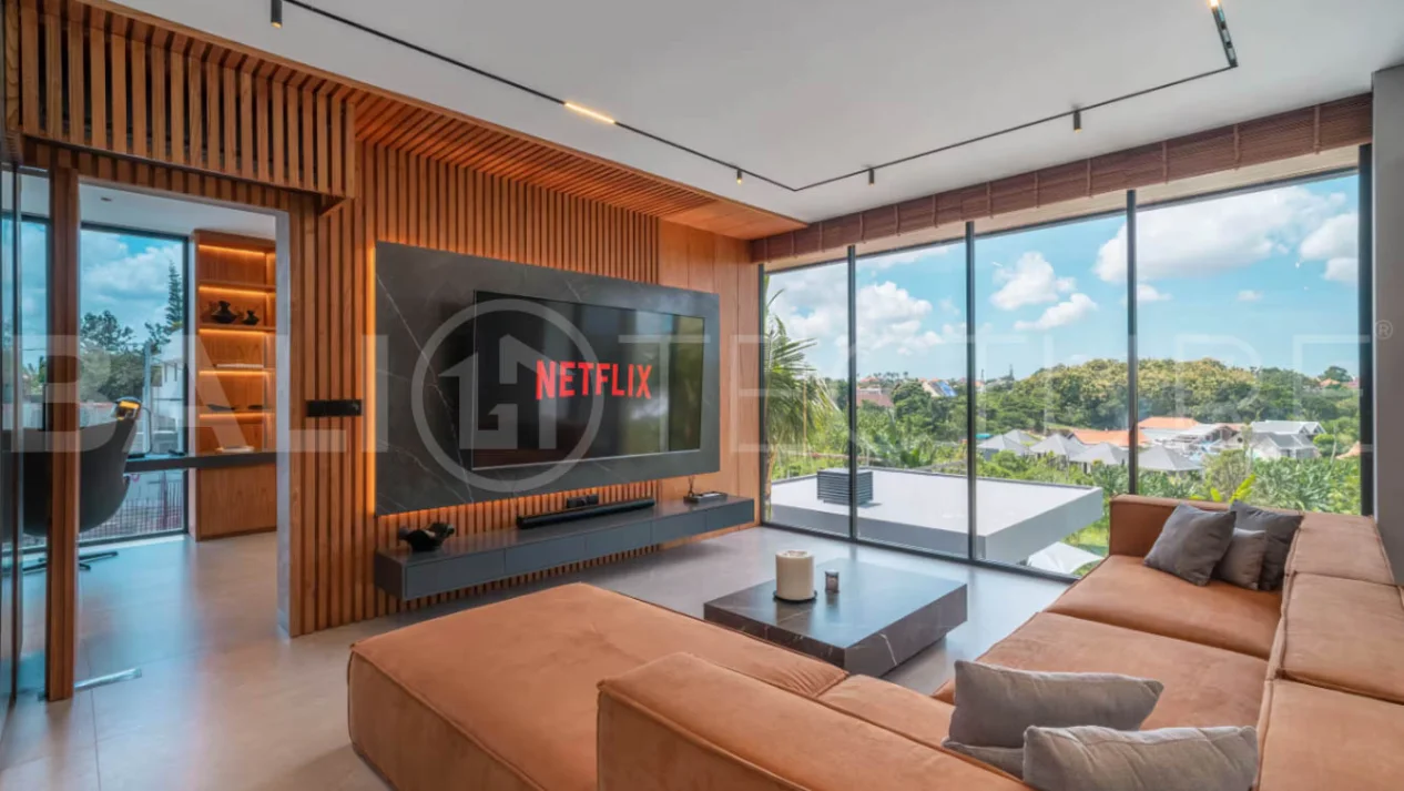 Luxury four bedroom leasehold villa in Canggu, Bali, featuring a private garden, 45sqm swimming pool, spacious living area, modern kitchen, outdoor terrace, jacuzzi, and premium entertainment amenities.