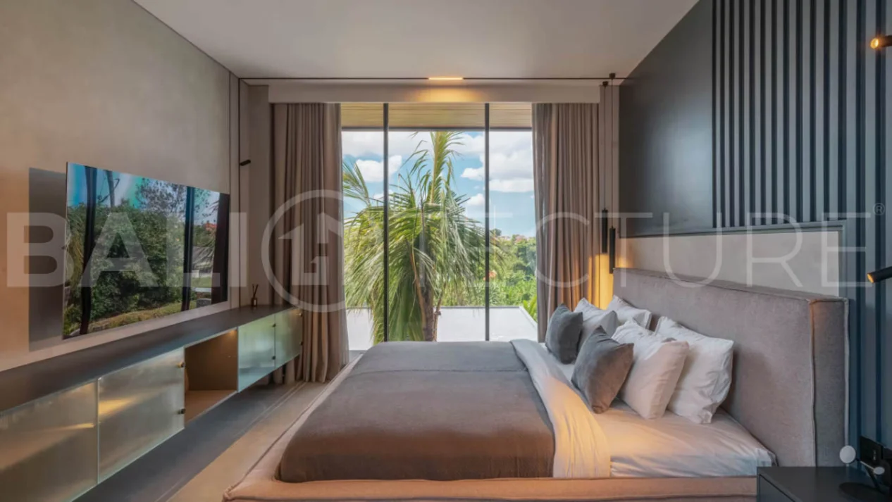 Luxury four bedroom leasehold villa in Canggu, Bali, featuring a private garden, 45sqm swimming pool, spacious living area, modern kitchen, outdoor terrace, jacuzzi, and premium entertainment amenities.