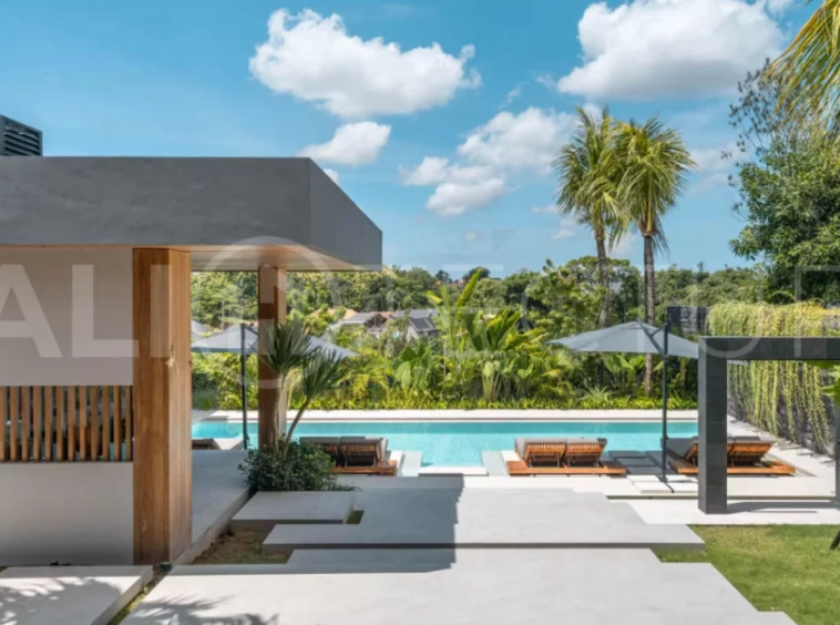 Luxury four bedroom leasehold villa in Canggu, Bali, featuring a private garden, 45sqm swimming pool, spacious living area, modern kitchen, outdoor terrace, jacuzzi, and premium entertainment amenities.