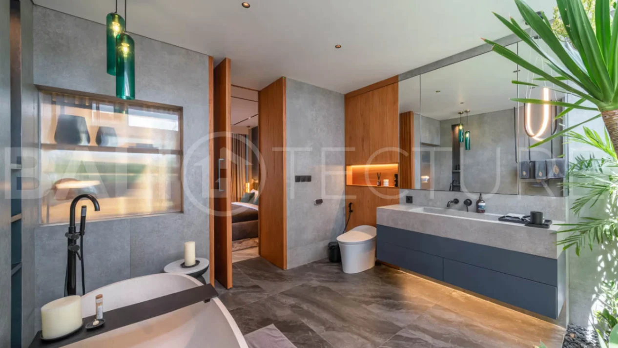 Luxury four bedroom leasehold villa in Canggu, Bali, featuring a private garden, 45sqm swimming pool, spacious living area, modern kitchen, outdoor terrace, jacuzzi, and premium entertainment amenities.