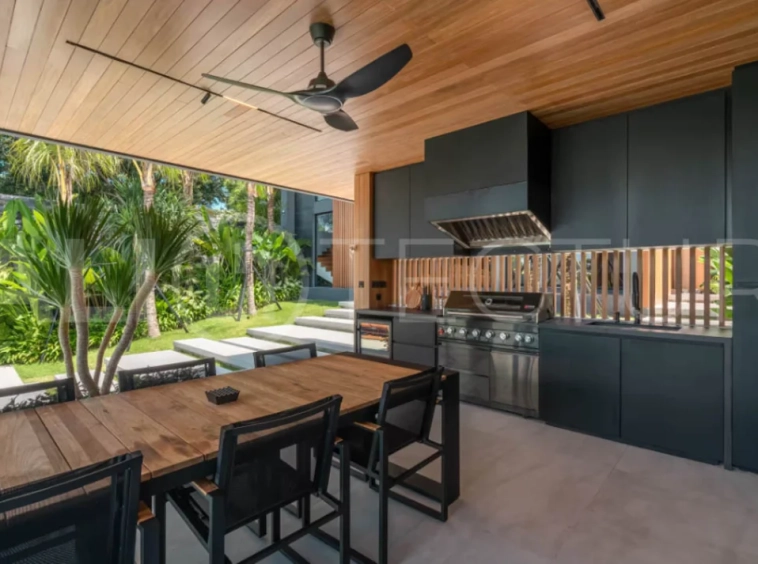 Luxury four bedroom leasehold villa in Canggu, Bali, featuring a private garden, 45sqm swimming pool, spacious living area, modern kitchen, outdoor terrace, jacuzzi, and premium entertainment amenities.