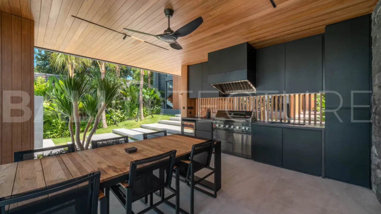 Luxury four bedroom leasehold villa in Canggu, Bali, featuring a private garden, 45sqm swimming pool, spacious living area, modern kitchen, outdoor terrace, jacuzzi, and premium entertainment amenities.