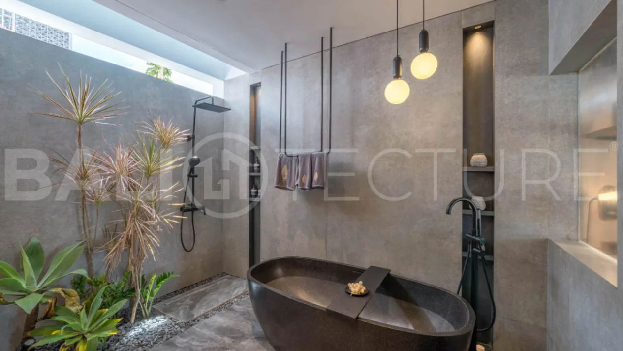 Luxury four bedroom leasehold villa in Canggu, Bali, featuring a private garden, 45sqm swimming pool, spacious living area, modern kitchen, outdoor terrace, jacuzzi, and premium entertainment amenities.