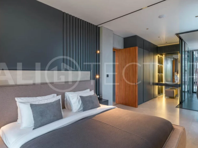 Luxury four bedroom leasehold villa in Canggu, Bali, featuring a private garden, 45sqm swimming pool, spacious living area, modern kitchen, outdoor terrace, jacuzzi, and premium entertainment amenities.