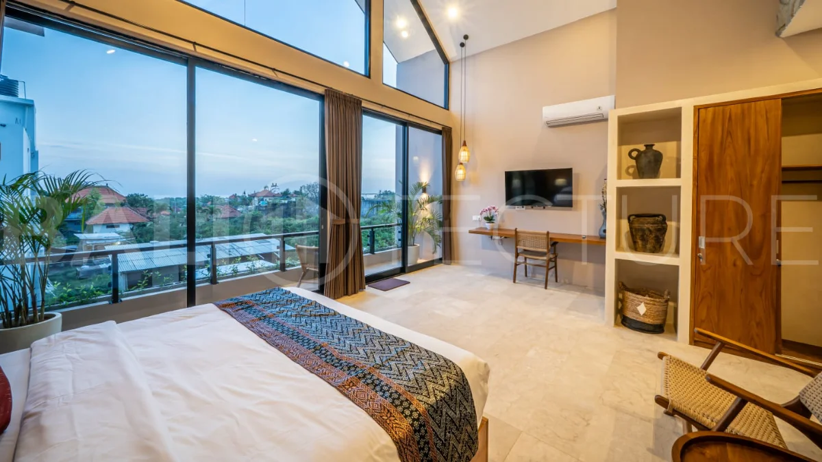 Brand-new 2-bedroom freehold villa near Pandawa Beach, featuring a modern tropical design, spacious interiors, high ceilings, large glass windows, private swimming pool, and elegant natural stone and wood finishes.