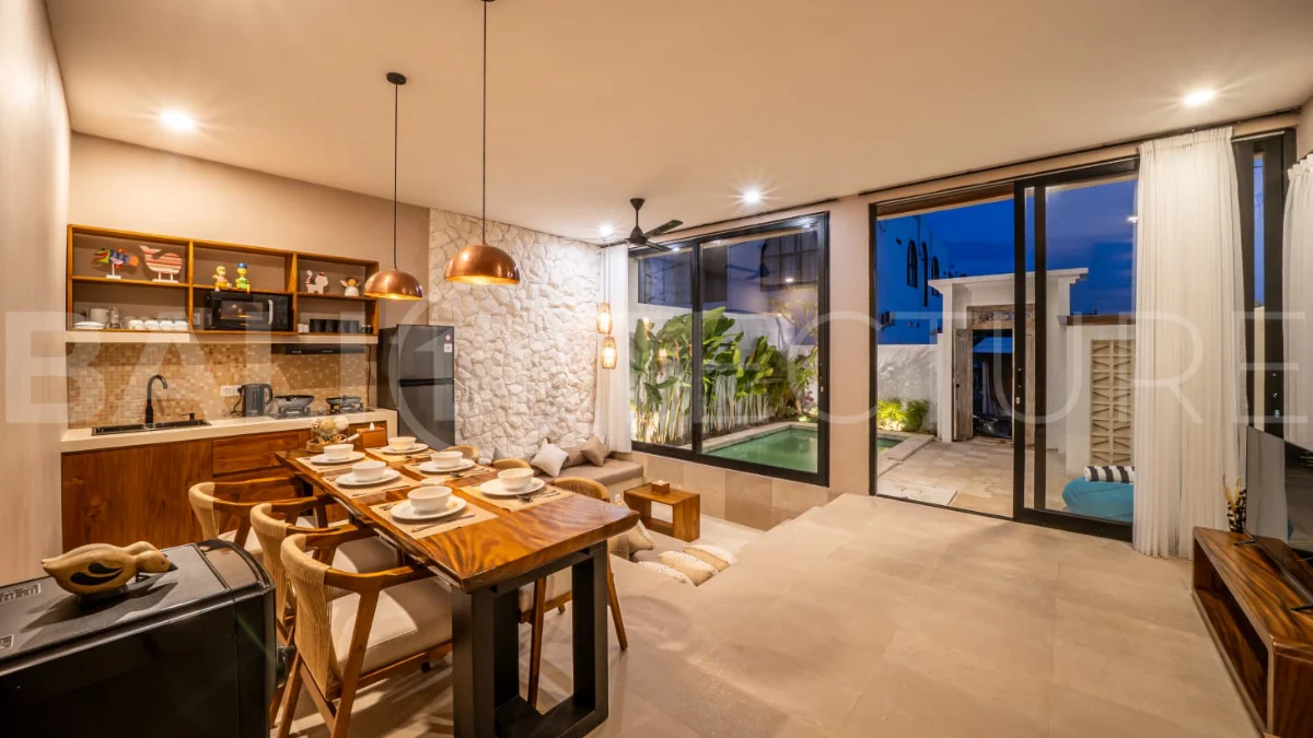 Brand-new 2-bedroom freehold villa near Pandawa Beach, featuring a modern tropical design, spacious interiors, high ceilings, large glass windows, private swimming pool, and elegant natural stone and wood finishes.