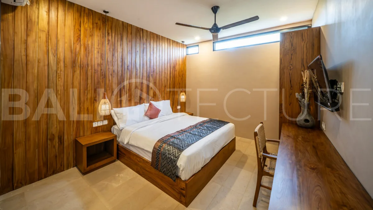 Brand-new 2-bedroom freehold villa near Pandawa Beach, featuring a modern tropical design, spacious interiors, high ceilings, large glass windows, private swimming pool, and elegant natural stone and wood finishes.