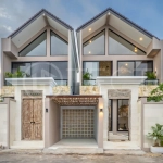 Brand-new 2-bedroom freehold villa near Pandawa Beach, featuring a modern tropical design, spacious interiors, high ceilings, large glass windows, private swimming pool, and elegant natural stone and wood finishes.