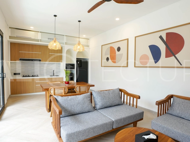 Modern 2-bedroom villa for sale in Jimbaran, Bali, featuring a contemporary open-plan design, 126 sqm of living space, two en-suite bedrooms, full furnishings, premium community facilities, and a 100-year leasehold option.
