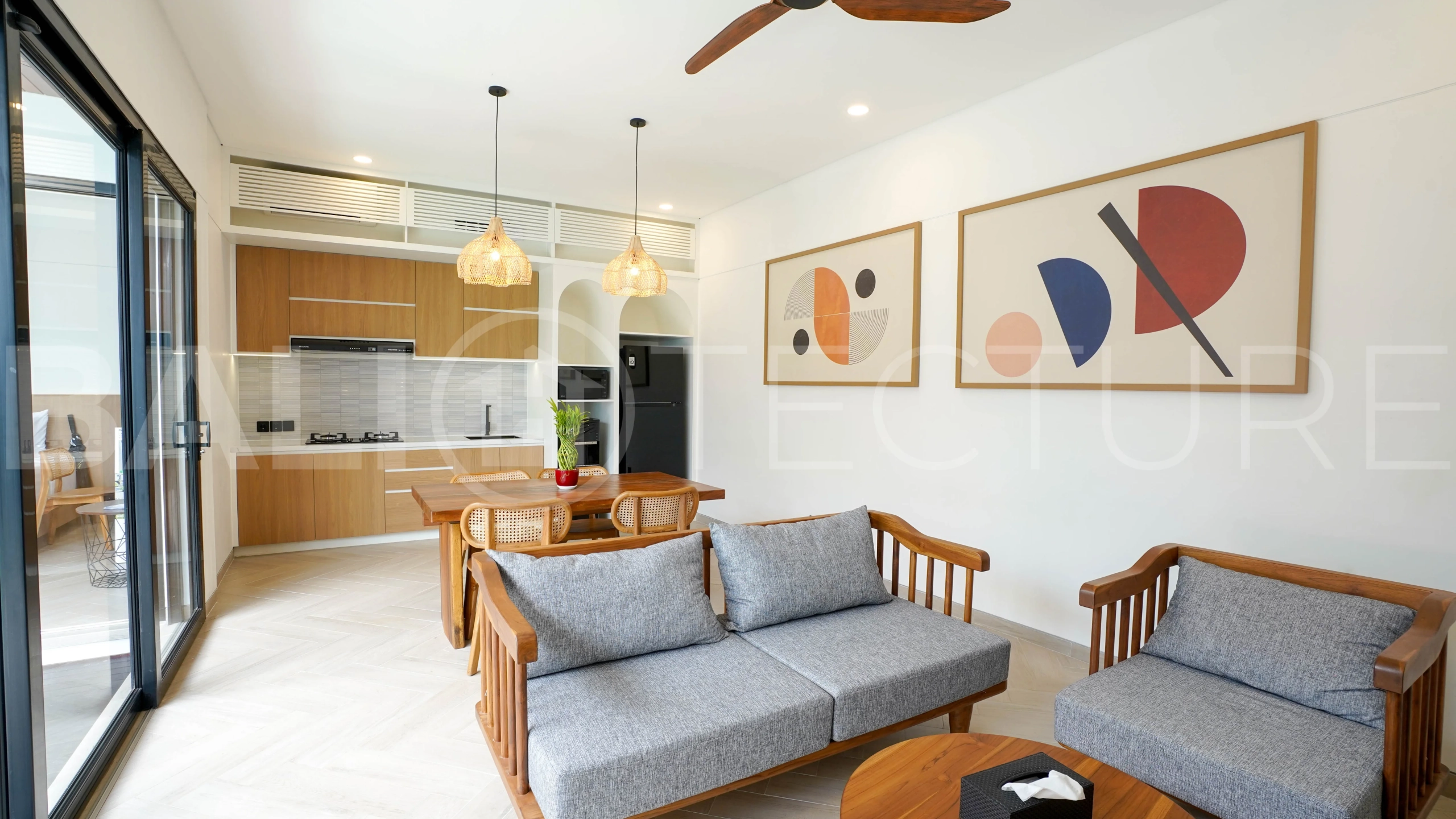 Modern 2-bedroom villa for sale in Jimbaran, Bali, featuring a contemporary open-plan design, 126 sqm of living space, two en-suite bedrooms, full furnishings, premium community facilities, and a 100-year leasehold option.