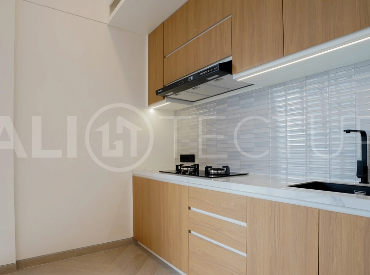 Modern 2-bedroom villa for sale in Jimbaran, Bali, featuring a contemporary open-plan design, 126 sqm of living space, two en-suite bedrooms, full furnishings, premium community facilities, and a 100-year leasehold option.