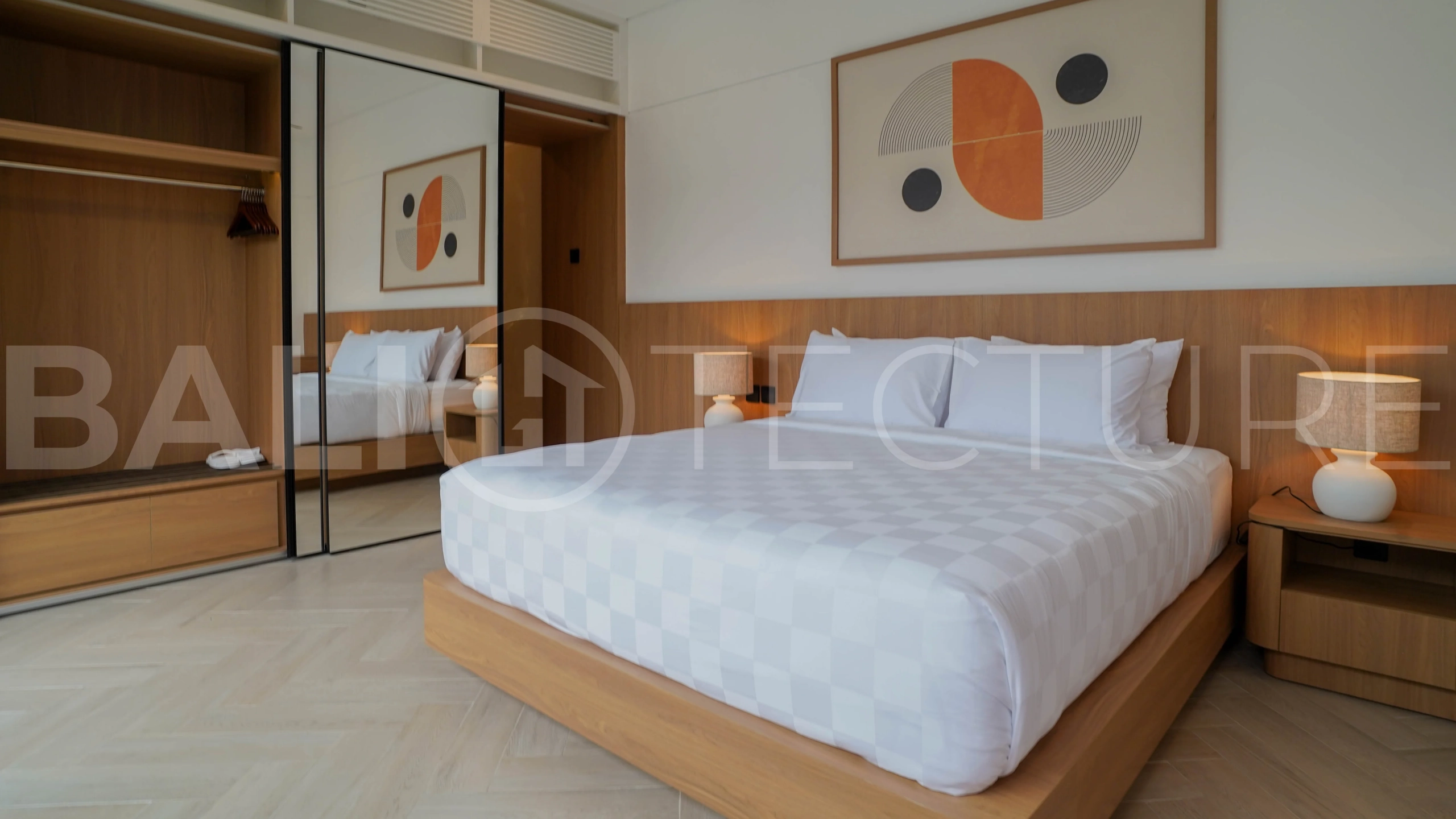 Modern 2-bedroom villa for sale in Jimbaran, Bali, featuring a contemporary open-plan design, 126 sqm of living space, two en-suite bedrooms, full furnishings, premium community facilities, and a 100-year leasehold option.