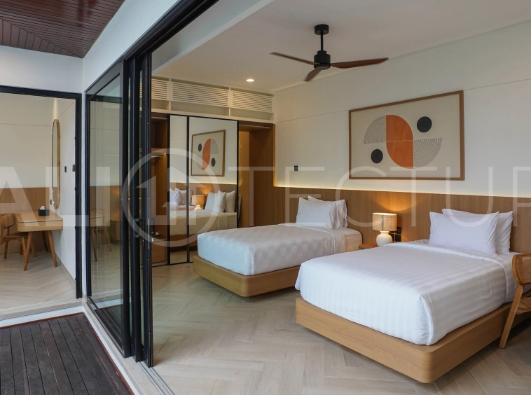 Modern 2-bedroom villa for sale in Jimbaran, Bali, featuring a contemporary open-plan design, 126 sqm of living space, two en-suite bedrooms, full furnishings, premium community facilities, and a 100-year leasehold option.
