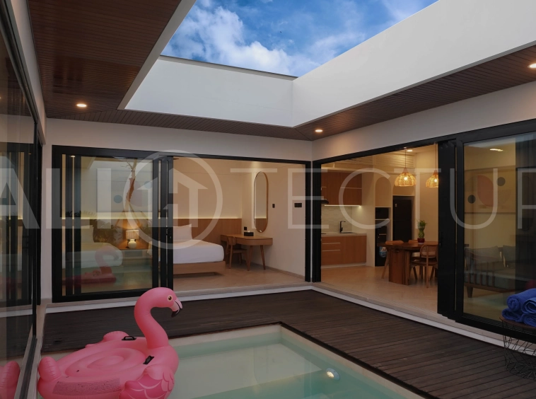 Modern 2-bedroom villa for sale in Jimbaran, Bali, featuring a contemporary open-plan design, 126 sqm of living space, two en-suite bedrooms, full furnishings, premium community facilities, and a 100-year leasehold option.