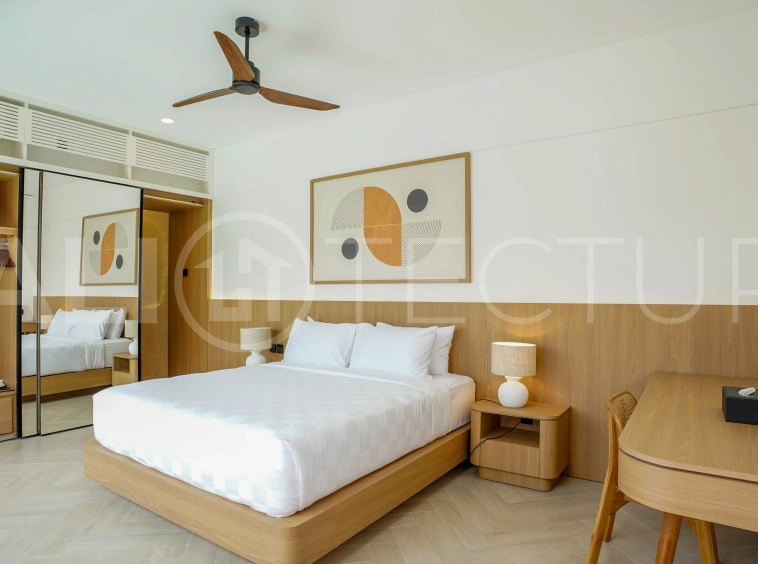 Modern 2-bedroom villa for sale in Jimbaran, Bali, featuring a contemporary open-plan design, 126 sqm of living space, two en-suite bedrooms, full furnishings, premium community facilities, and a 100-year leasehold option.