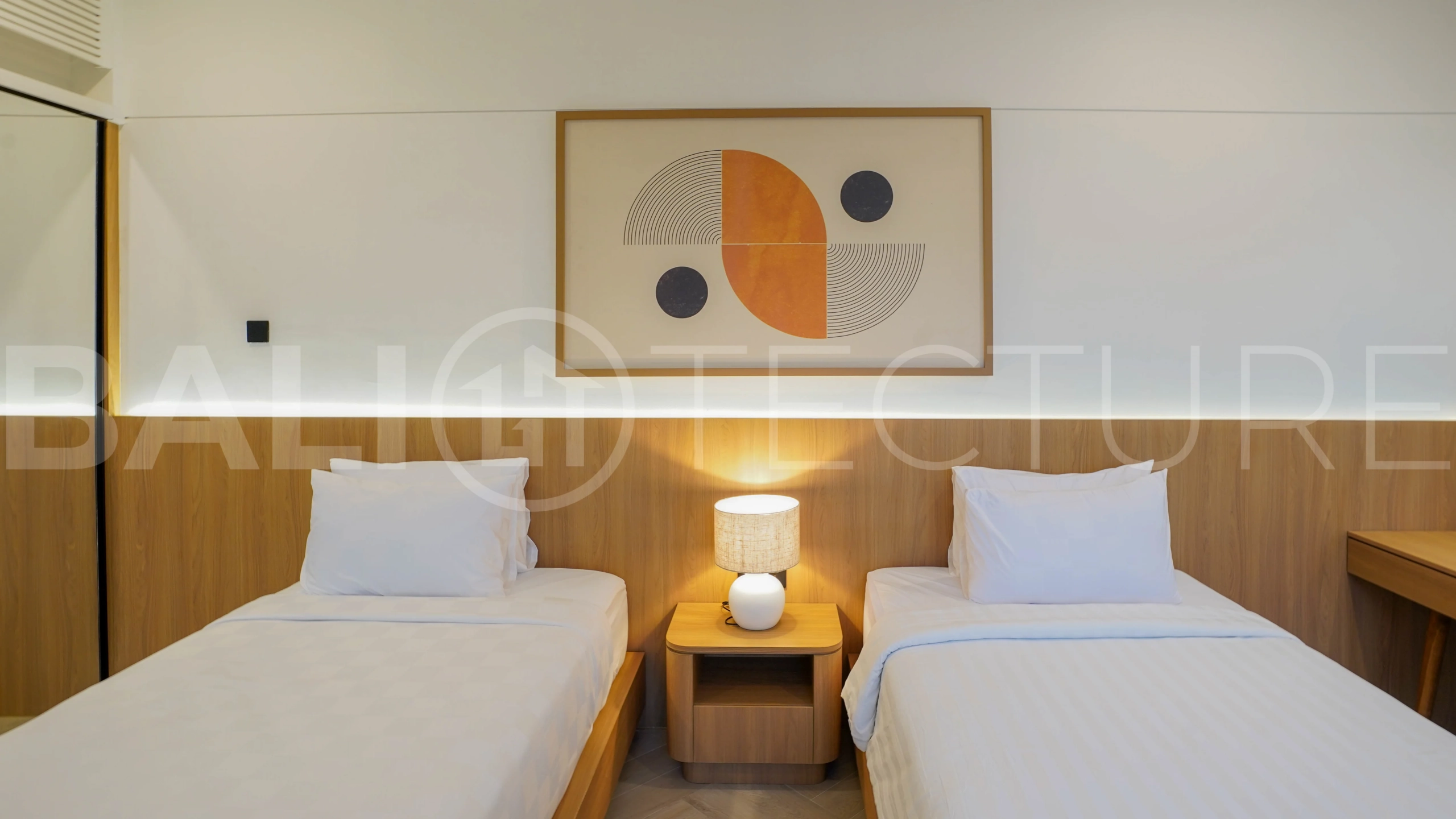 Modern 2-bedroom villa for sale in Jimbaran, Bali, featuring a contemporary open-plan design, 126 sqm of living space, two en-suite bedrooms, full furnishings, premium community facilities, and a 100-year leasehold option.