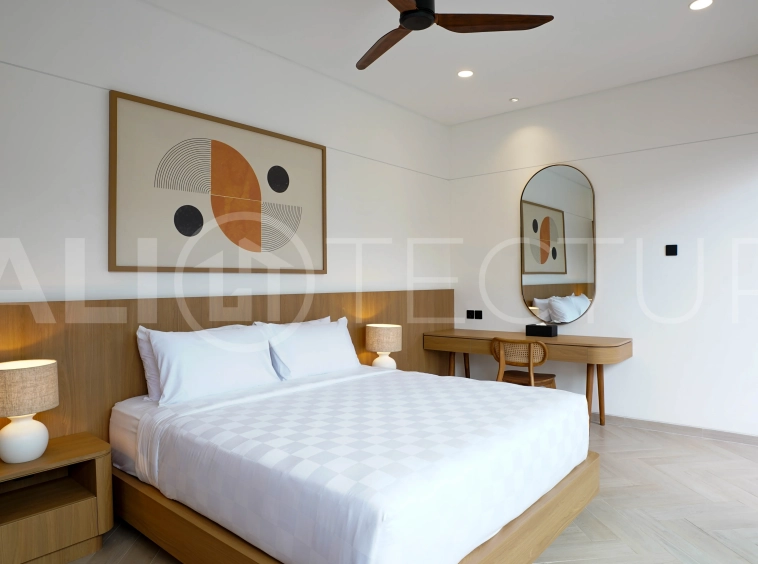 Modern 2-bedroom villa for sale in Jimbaran, Bali, featuring a contemporary open-plan design, 126 sqm of living space, two en-suite bedrooms, full furnishings, premium community facilities, and a 100-year leasehold option.