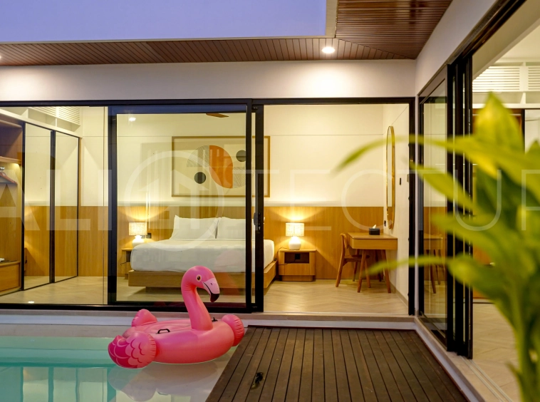 Modern 2-bedroom villa for sale in Jimbaran, Bali, featuring a contemporary open-plan design, 126 sqm of living space, two en-suite bedrooms, full furnishings, premium community facilities, and a 100-year leasehold option.