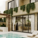 Fully furnished two bedroom villa in Cepaka, Tabanan, featuring three bathrooms, contemporary tropical design, private pool garden, pergola lounge, parking, and tranquil rice paddies surroundings.