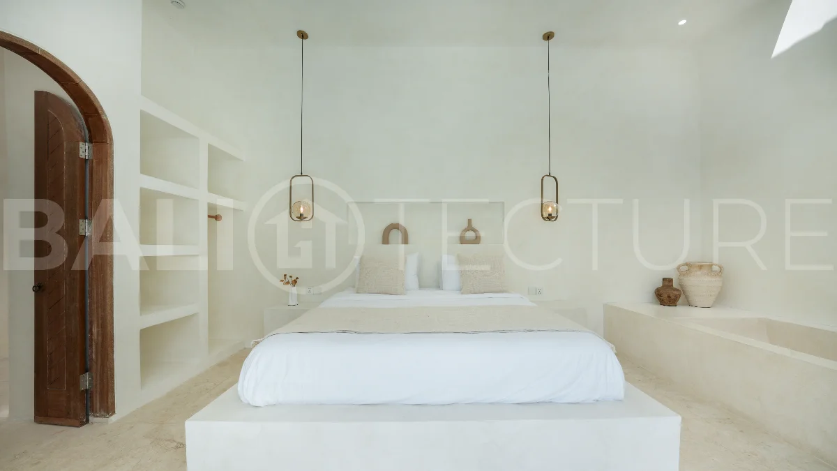 Newly built modern minimalist 2-bedroom villa in Padonan, Canggu, featuring a private swimming pool, tropical landscaping, enclosed living areas, and a contemporary tropical design.