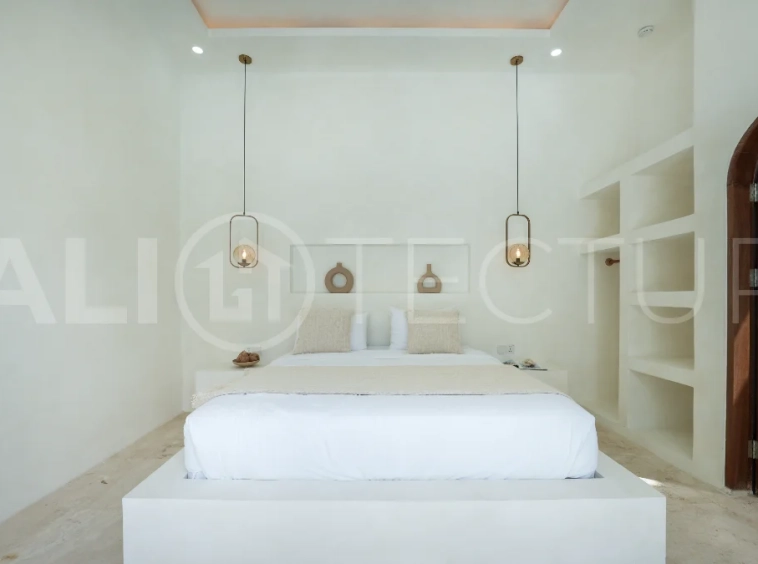 Newly built modern minimalist 2-bedroom villa in Padonan, Canggu, featuring a private swimming pool, tropical landscaping, enclosed living areas, and a contemporary tropical design.