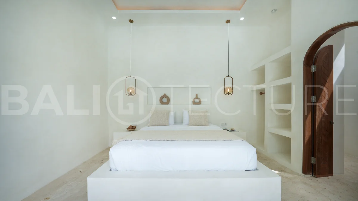Newly built modern minimalist 2-bedroom villa in Padonan, Canggu, featuring a private swimming pool, tropical landscaping, enclosed living areas, and a contemporary tropical design.