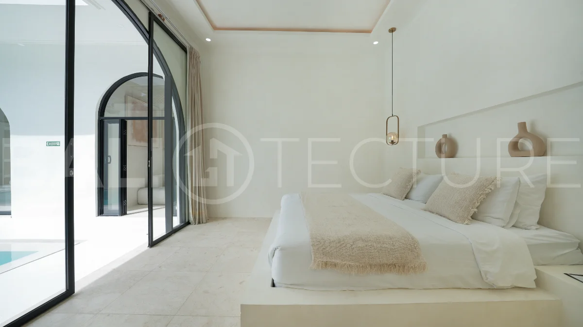 Newly built modern minimalist 2-bedroom villa in Padonan, Canggu, featuring a private swimming pool, tropical landscaping, enclosed living areas, and a contemporary tropical design.