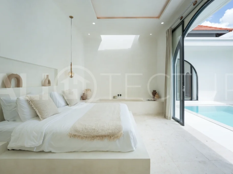 Newly built modern minimalist 2-bedroom villa in Padonan, Canggu, featuring a private swimming pool, tropical landscaping, enclosed living areas, and a contemporary tropical design.
