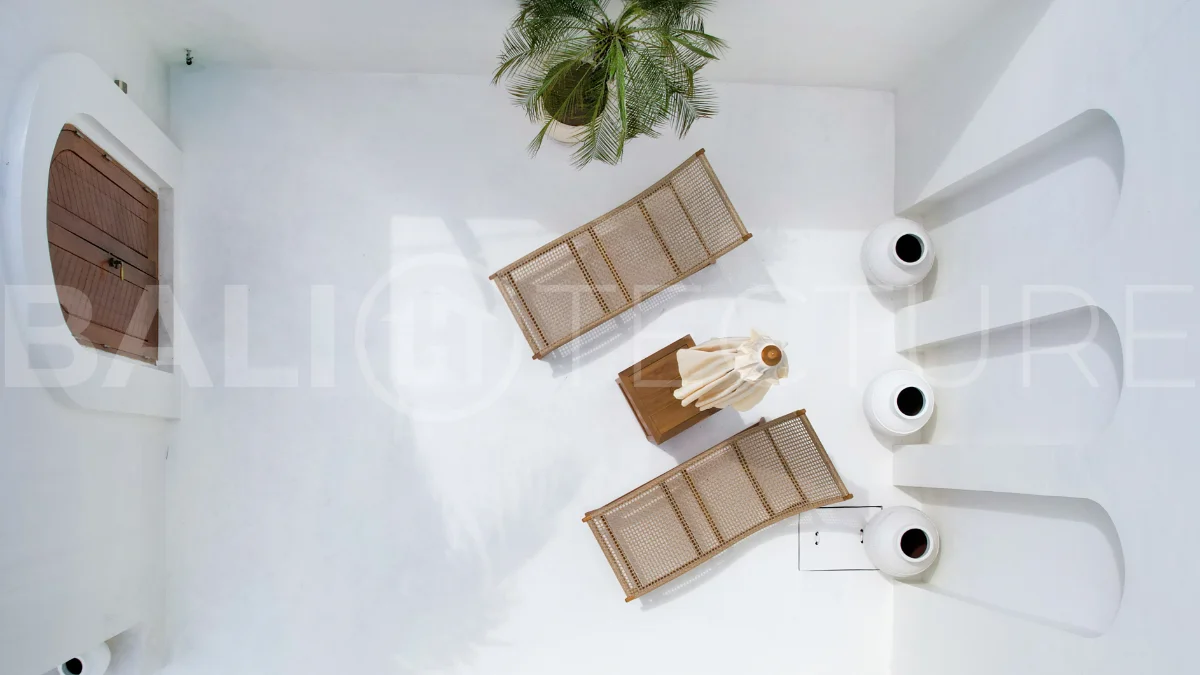 Newly built modern minimalist 2-bedroom villa in Padonan, Canggu, featuring a private swimming pool, tropical landscaping, enclosed living areas, and a contemporary tropical design.