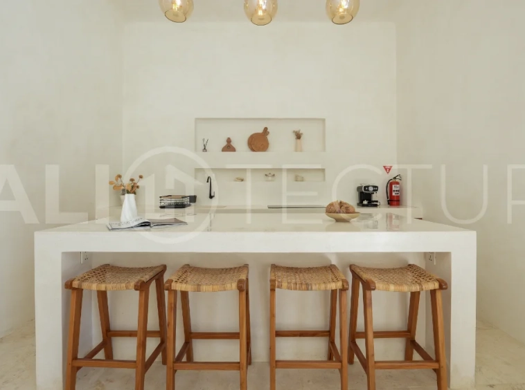 Newly built modern minimalist 2-bedroom villa in Padonan, Canggu, featuring a private swimming pool, tropical landscaping, enclosed living areas, and a contemporary tropical design.