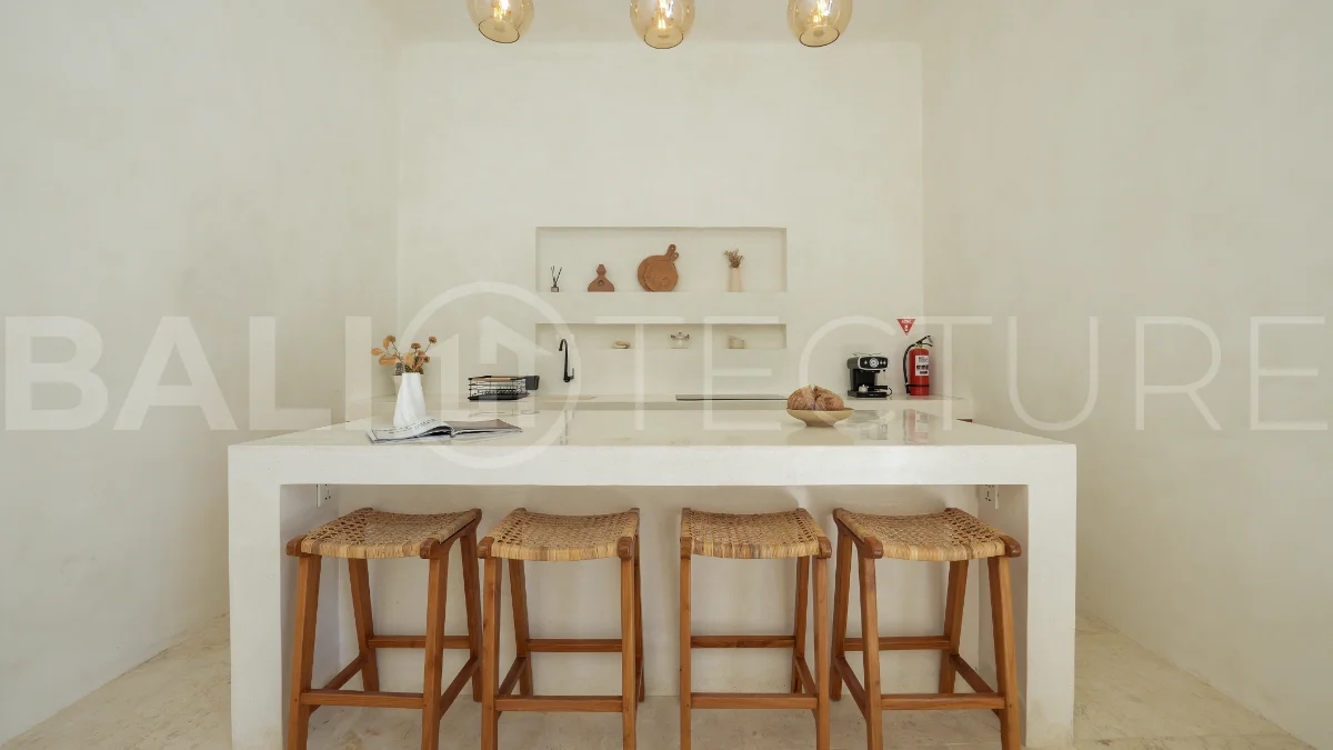 Newly built modern minimalist 2-bedroom villa in Padonan, Canggu, featuring a private swimming pool, tropical landscaping, enclosed living areas, and a contemporary tropical design.