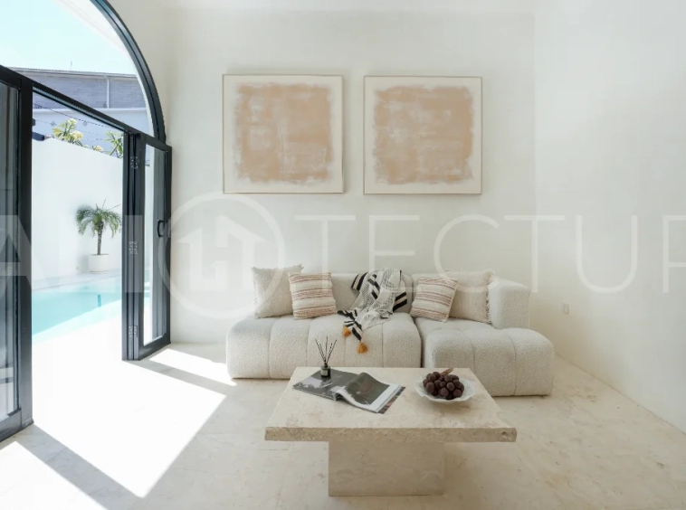 Newly built modern minimalist 2-bedroom villa in Padonan, Canggu, featuring a private swimming pool, tropical landscaping, enclosed living areas, and a contemporary tropical design.