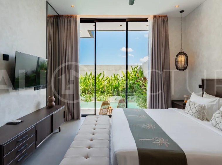 Modern 2-bedroom villa for sale near Pererenan Beach, Canggu, featuring stylish interiors, spacious living areas, tropical greenery, and a private swimming pool.