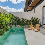 Modern 2-bedroom villa for sale near Pererenan Beach, Canggu, featuring stylish interiors, spacious living areas, tropical greenery, and a private swimming pool.