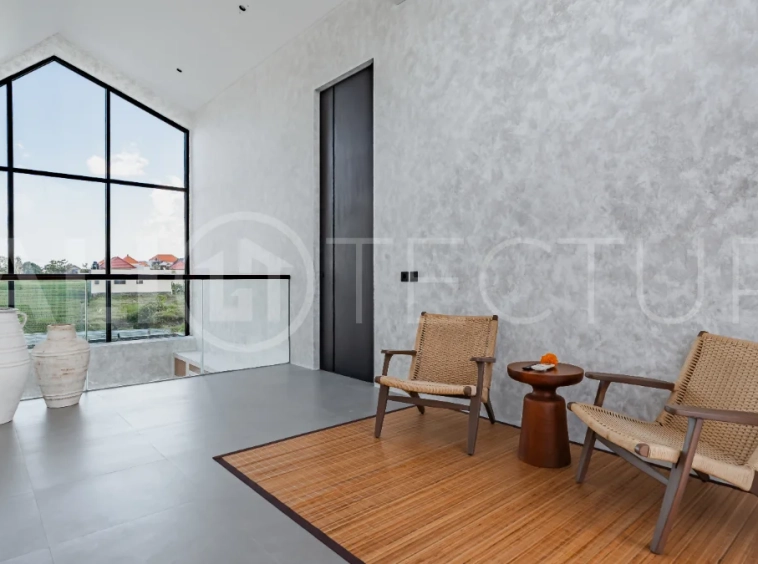 Modern 2-bedroom villa for sale near Pererenan Beach, Canggu, featuring stylish interiors, spacious living areas, tropical greenery, and a private swimming pool.