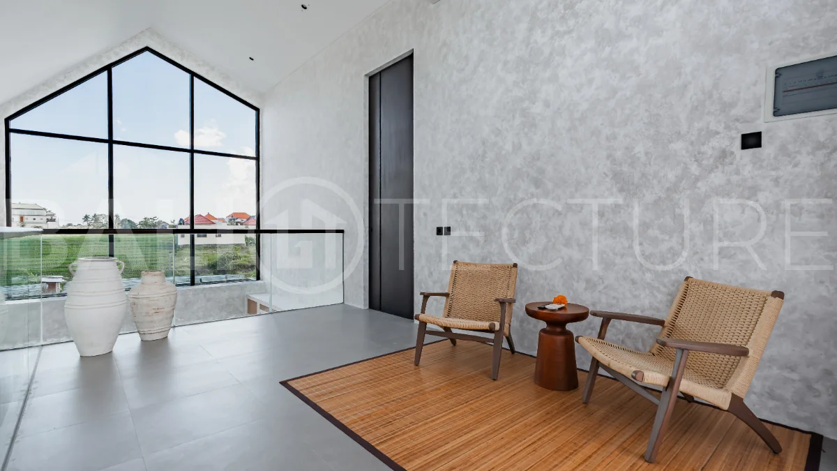 Modern 2-bedroom villa for sale near Pererenan Beach, Canggu, featuring stylish interiors, spacious living areas, tropical greenery, and a private swimming pool.