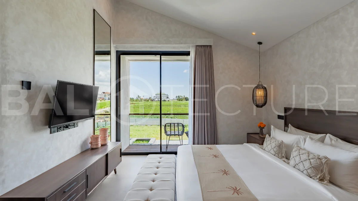Modern 2-bedroom villa for sale near Pererenan Beach, Canggu, featuring stylish interiors, spacious living areas, tropical greenery, and a private swimming pool.