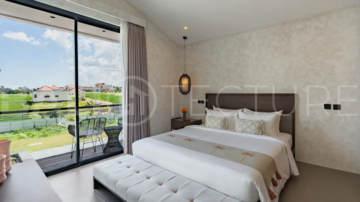 Modern 2-bedroom villa for sale near Pererenan Beach, Canggu, featuring stylish interiors, spacious living areas, tropical greenery, and a private swimming pool.