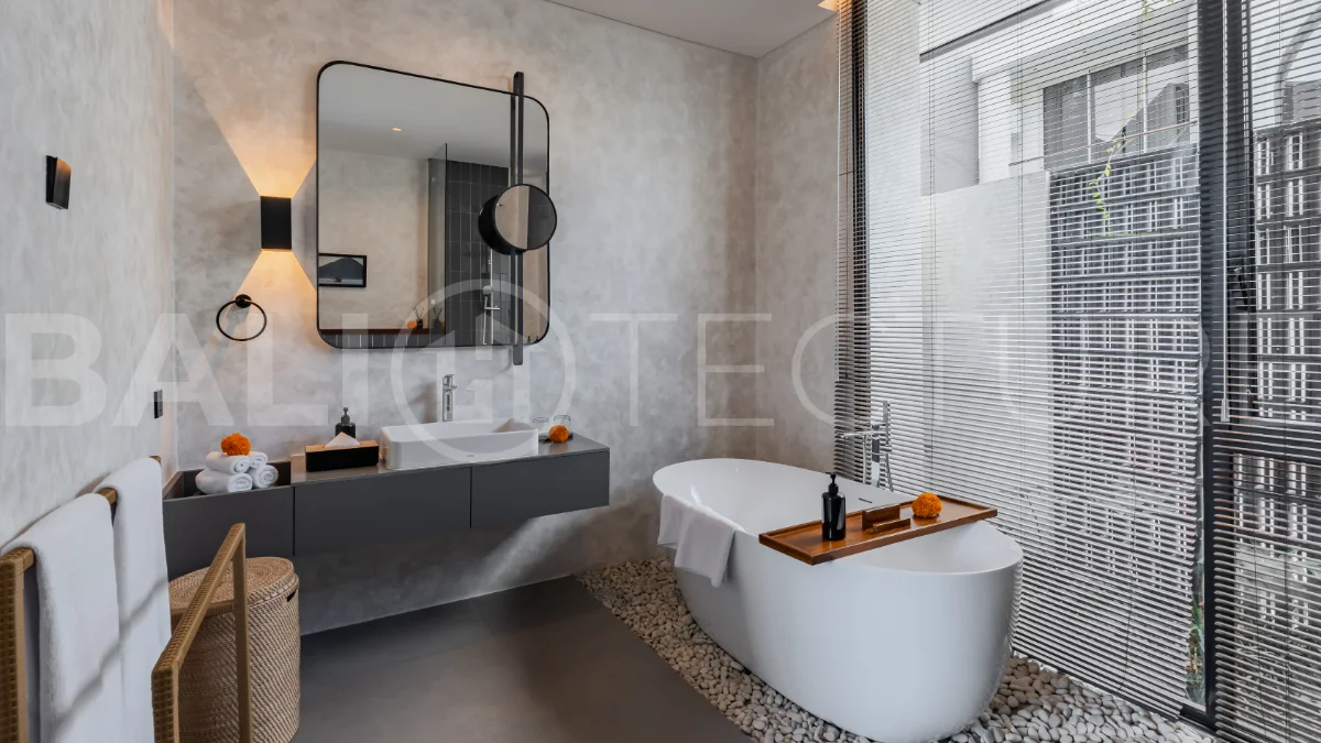Modern 2-bedroom villa for sale near Pererenan Beach, Canggu, featuring stylish interiors, spacious living areas, tropical greenery, and a private swimming pool.