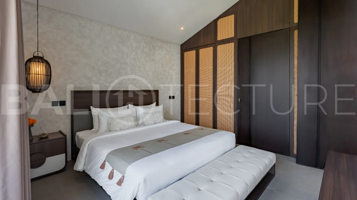 Modern 2-bedroom villa for sale near Pererenan Beach, Canggu, featuring stylish interiors, spacious living areas, tropical greenery, and a private swimming pool.