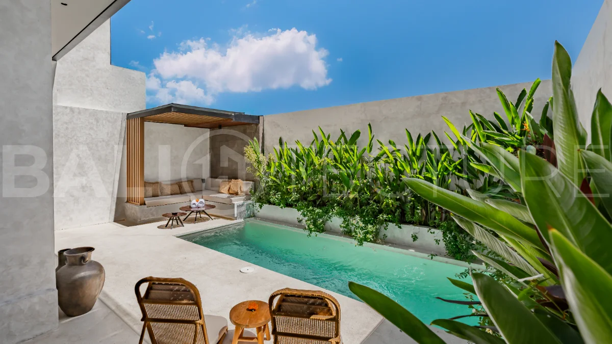 Modern 2-bedroom villa for sale near Pererenan Beach, Canggu, featuring stylish interiors, spacious living areas, tropical greenery, and a private swimming pool.