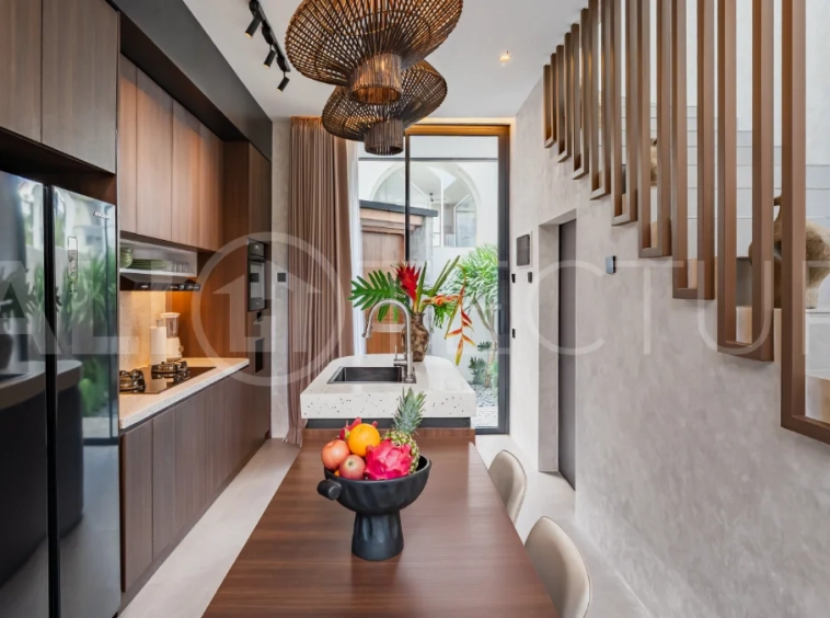 Modern 2-bedroom villa for sale near Pererenan Beach, Canggu, featuring stylish interiors, spacious living areas, tropical greenery, and a private swimming pool.