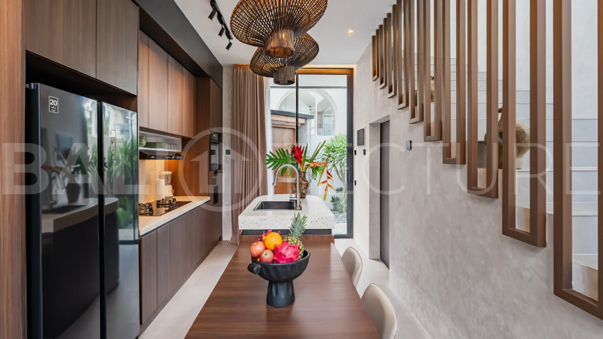 Modern 2-bedroom villa for sale near Pererenan Beach, Canggu, featuring stylish interiors, spacious living areas, tropical greenery, and a private swimming pool.