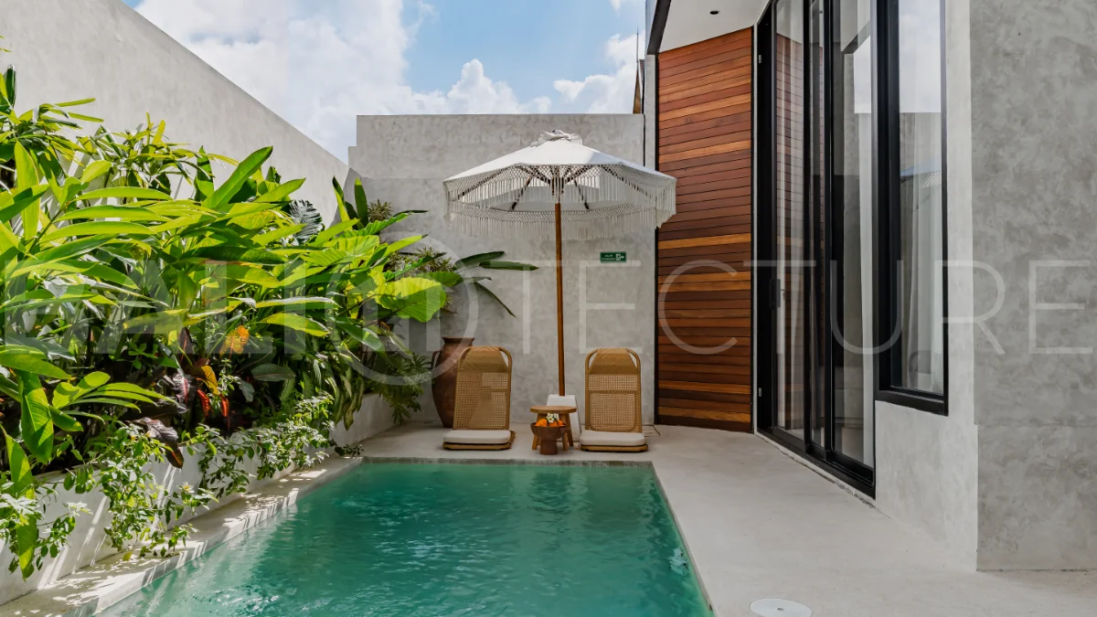Modern 2-bedroom villa for sale near Pererenan Beach, Canggu, featuring stylish interiors, spacious living areas, tropical greenery, and a private swimming pool.