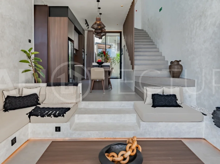 Modern 2-bedroom villa for sale near Pererenan Beach, Canggu, featuring stylish interiors, spacious living areas, tropical greenery, and a private swimming pool.