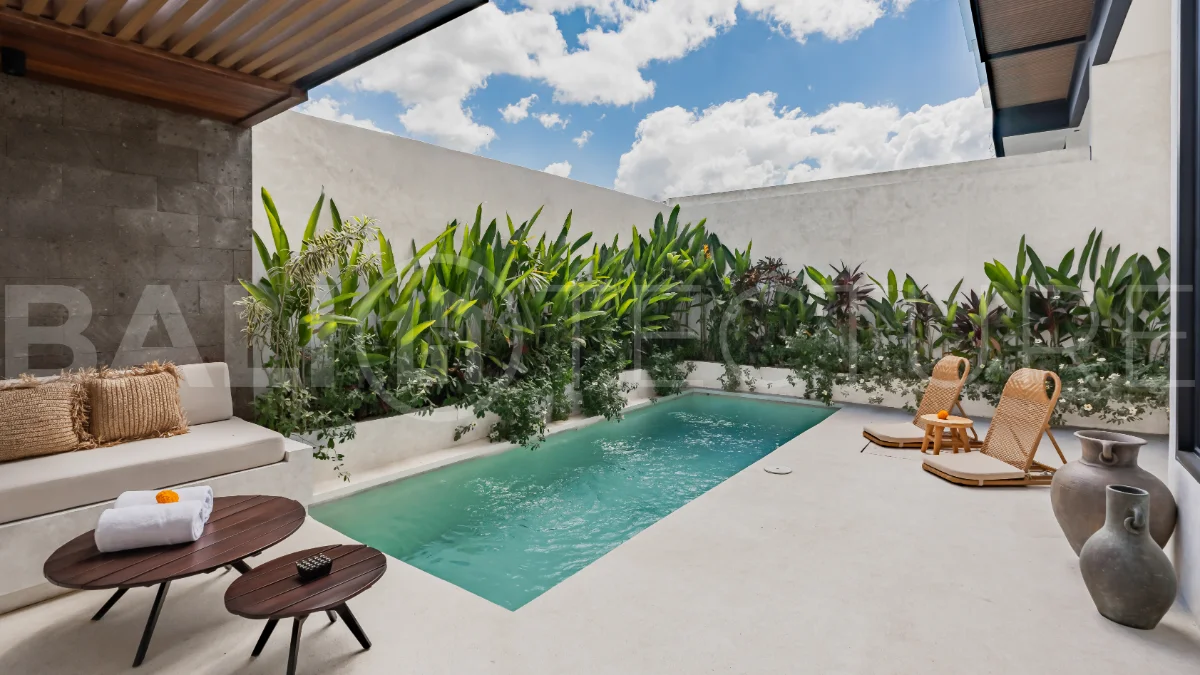 Modern 2-bedroom villa for sale near Pererenan Beach, Canggu, featuring stylish interiors, spacious living areas, tropical greenery, and a private swimming pool.