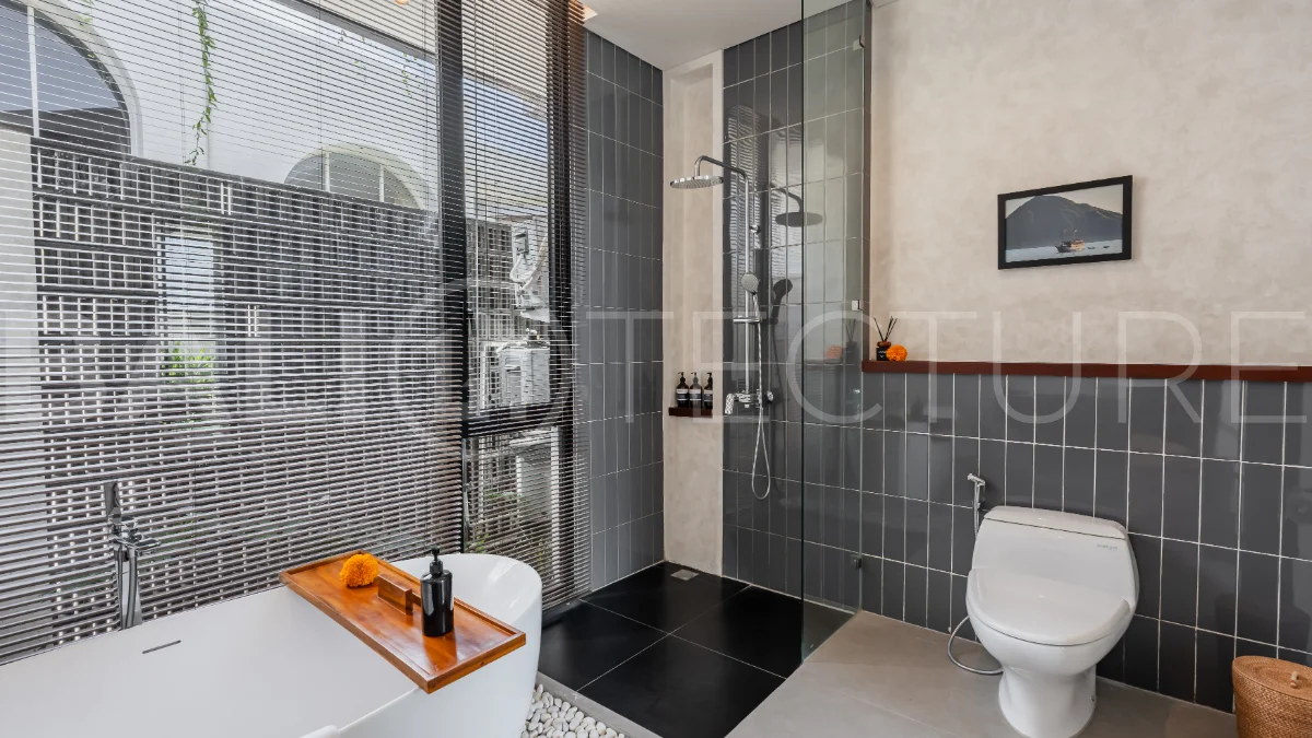 Modern 2-bedroom villa for sale near Pererenan Beach, Canggu, featuring stylish interiors, spacious living areas, tropical greenery, and a private swimming pool.