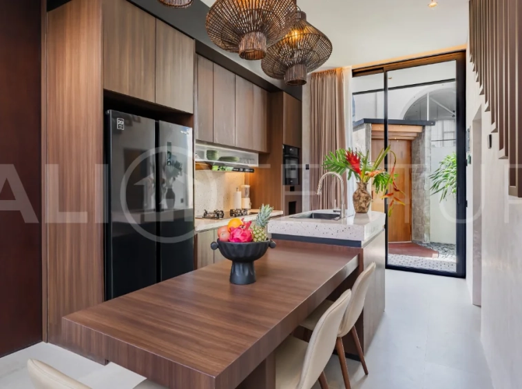 Modern 2-bedroom villa for sale near Pererenan Beach, Canggu, featuring stylish interiors, spacious living areas, tropical greenery, and a private swimming pool.